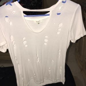 White tee with holes